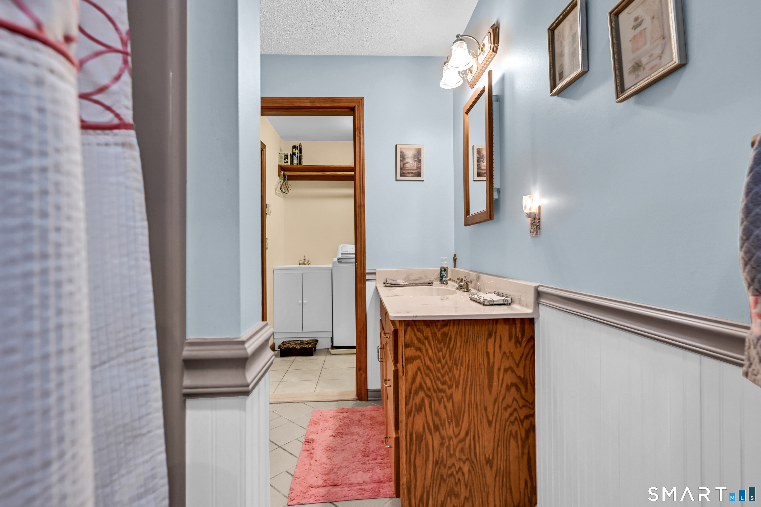 155 Lake Harwinton Road Harwinton, CT 06791 - Photo 26 of 39 a bathroom with a sink vanity and mirror