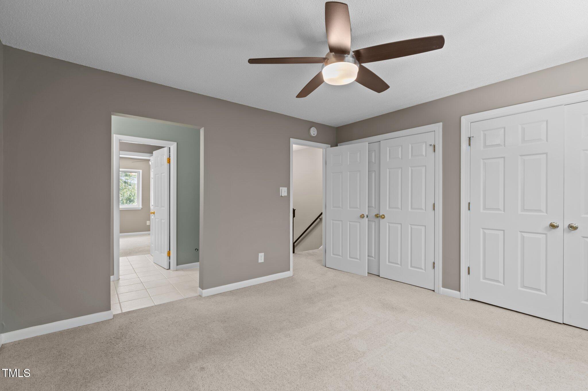 7159 Sandy Creek Drive Raleigh, NC 27615 - Photo 28 of 58 primary bedroom with 2 closets