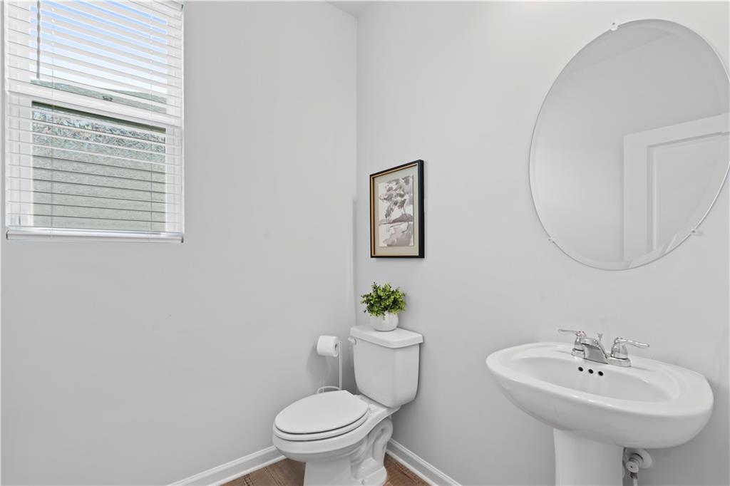 4780 Mock Orange Street Atlanta, GA 30331 - Photo 11 of 47 a bathroom with a sink toilet and a mirror