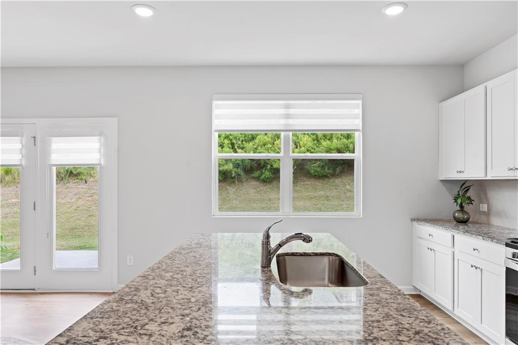 4780 Mock Orange Street Atlanta, GA 30331 - Photo 19 of 47 a kitchen with a sink and a window