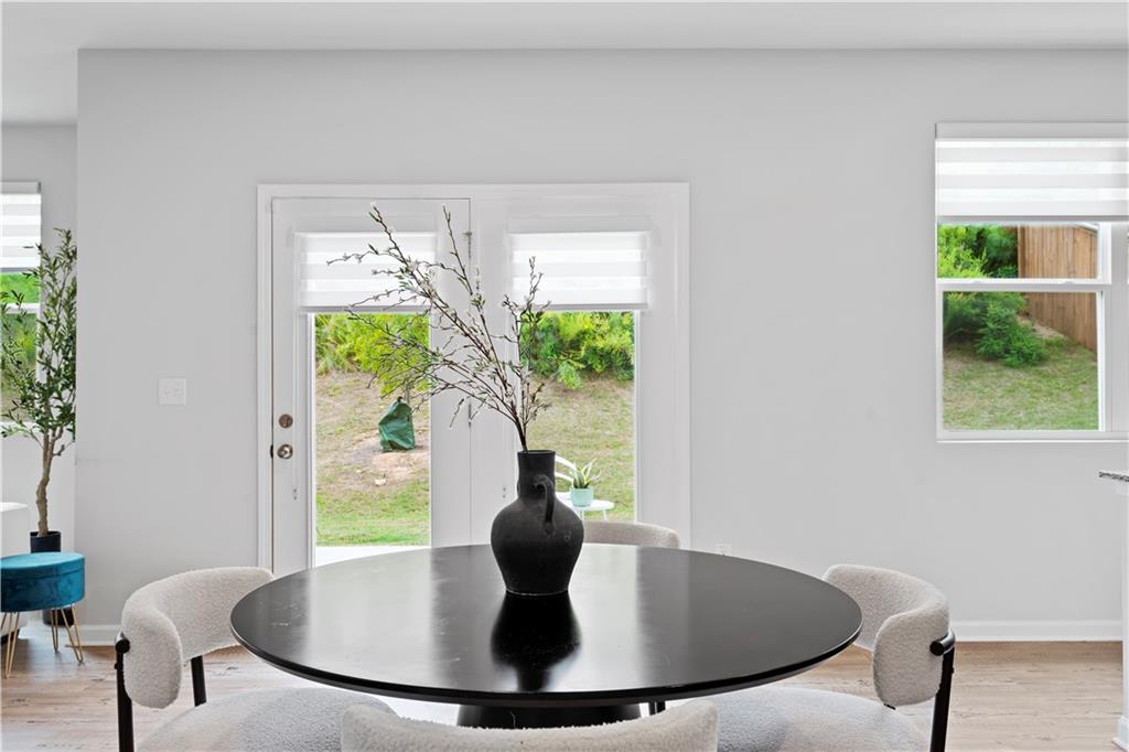 4780 Mock Orange Street Atlanta, GA 30331 - Photo 20 of 47 a close view of dining table with a potted plant