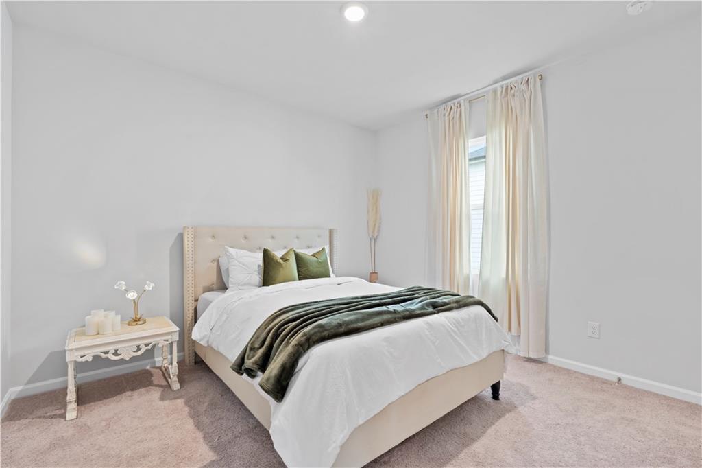 4780 Mock Orange Street Atlanta, GA 30331 - Photo 41 of 47 a bedroom with a bed and a window