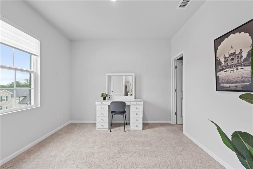 4780 Mock Orange Street Atlanta, GA 30331 - Photo 42 of 47 a view of a workspace with furniture and windows