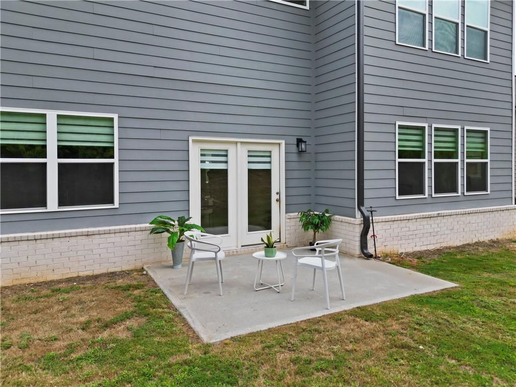 4780 Mock Orange Street Atlanta, GA 30331 - Photo 45 of 47 a view of an house with swimming pool and porch with furniture