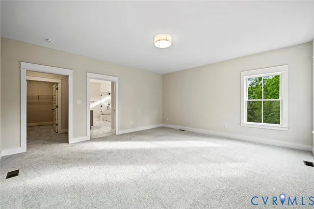 an empty room with windows