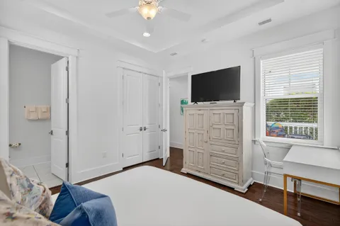 a view of living room with furniture and wooden floor