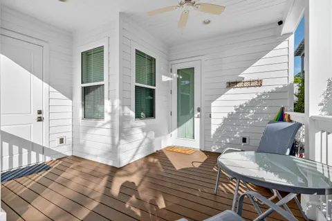 an aerial view of a house with yard