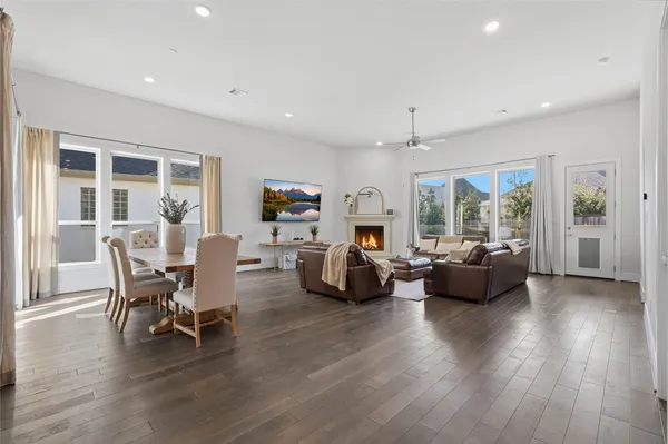 a kitchen with stainless steel appliances granite countertop a refrigerator and a stove