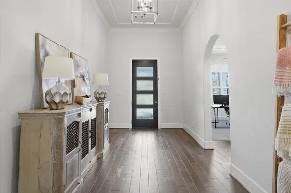 a view of dining room with furniture and wooden floor
