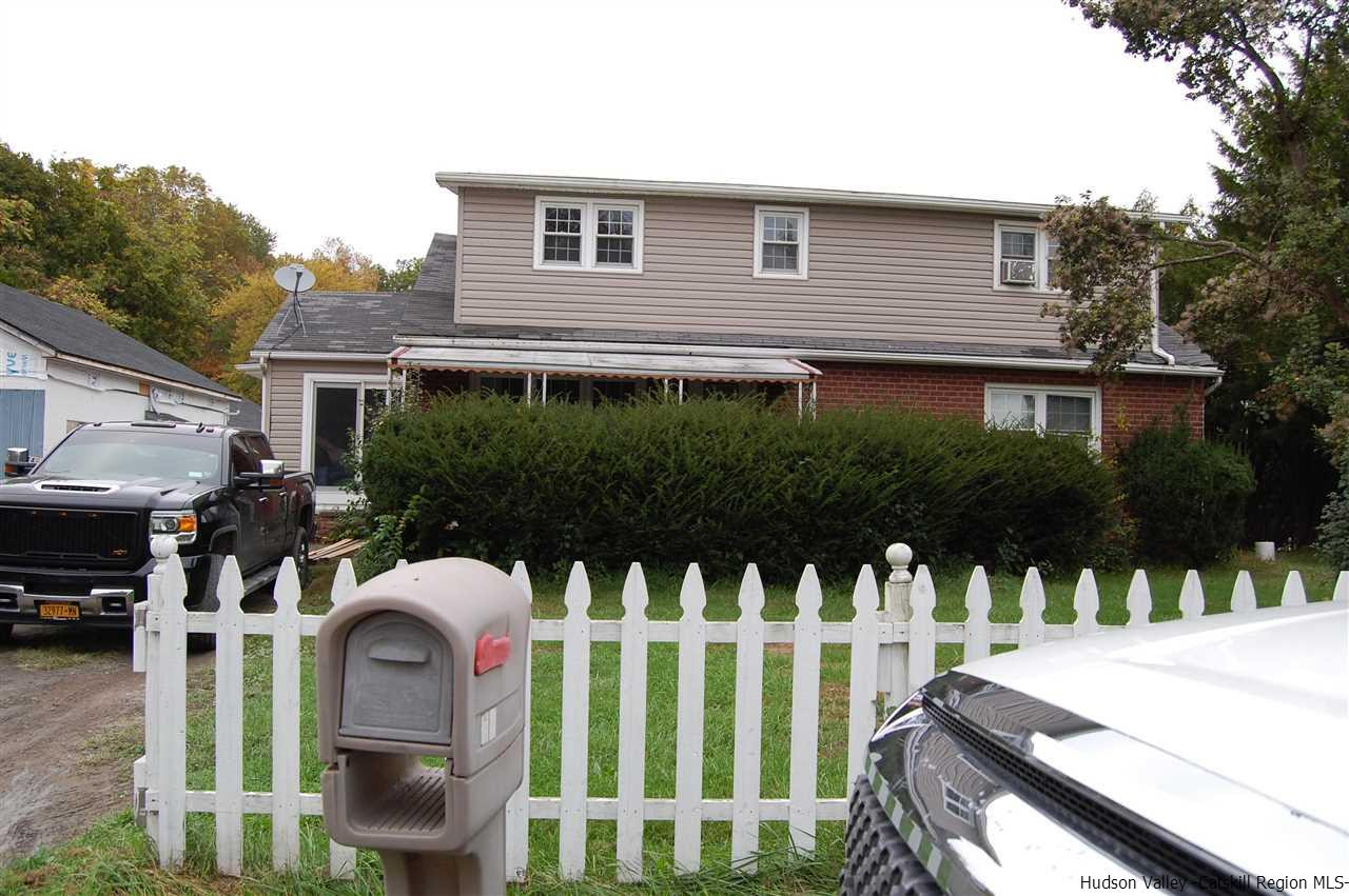 12 Cafaldo Drive Saugerties, NY 12477 - Photo 1 of 17 a front view of house with yard and green space
