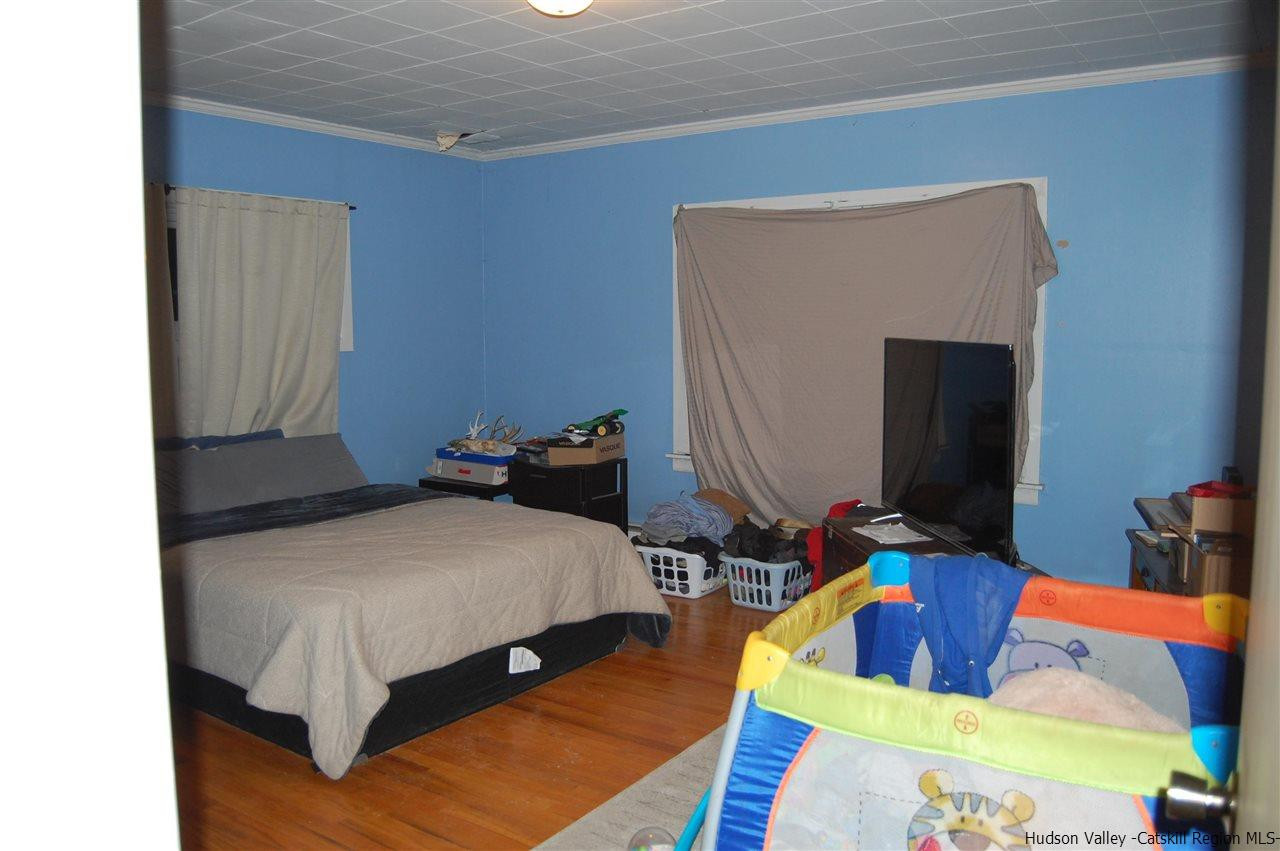 12 Cafaldo Drive Saugerties, NY 12477 - Photo 7 of 17 a bed room with a bed and a television