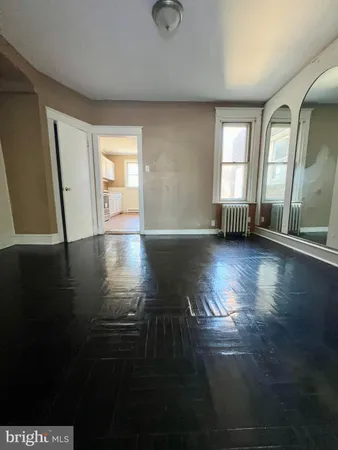 a view of livingroom with hardwood floor and window