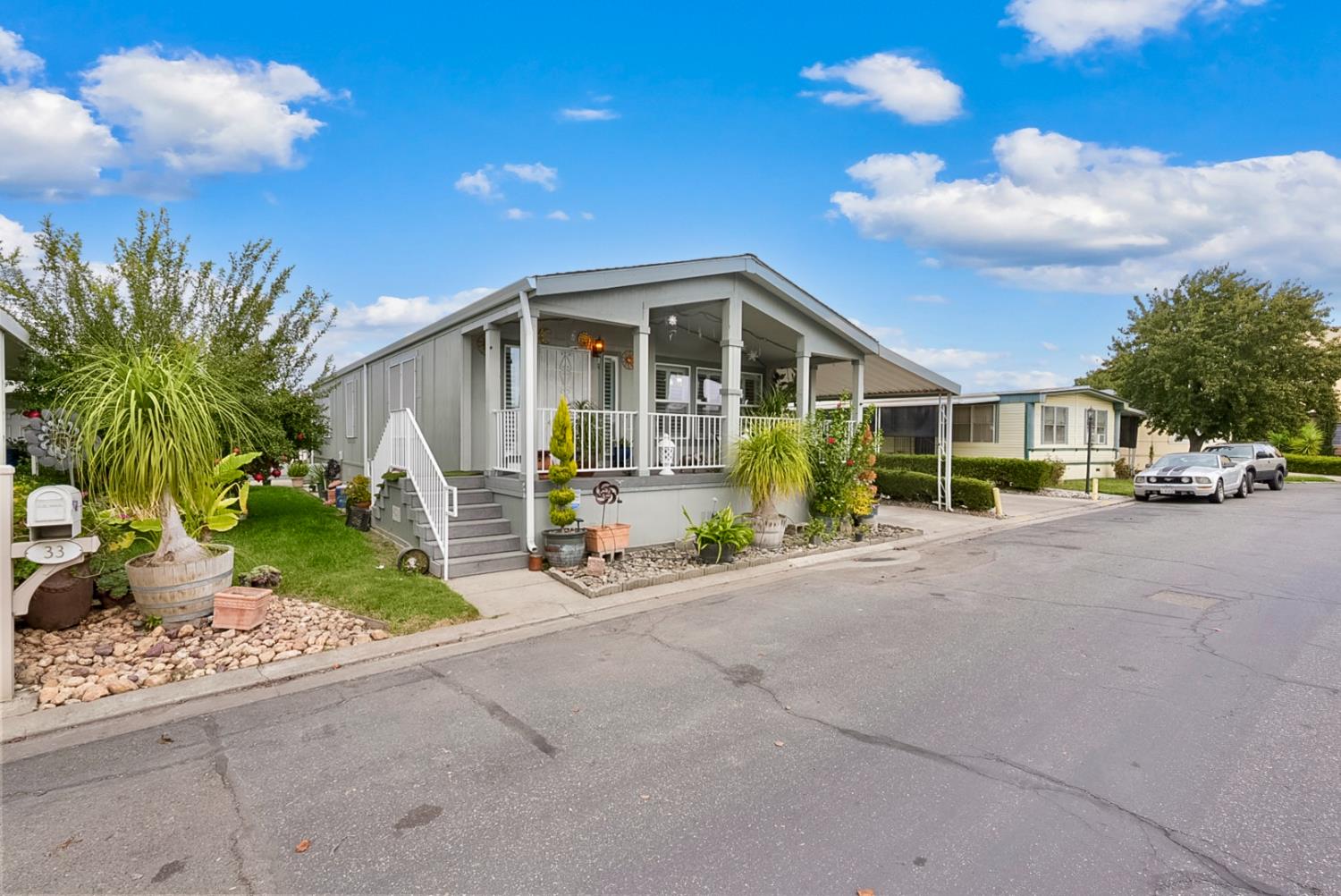 2841 Fowler Road, Unit 33 Ceres, CA 95307 - Photo 2 of 29 a front view of a house with garden
