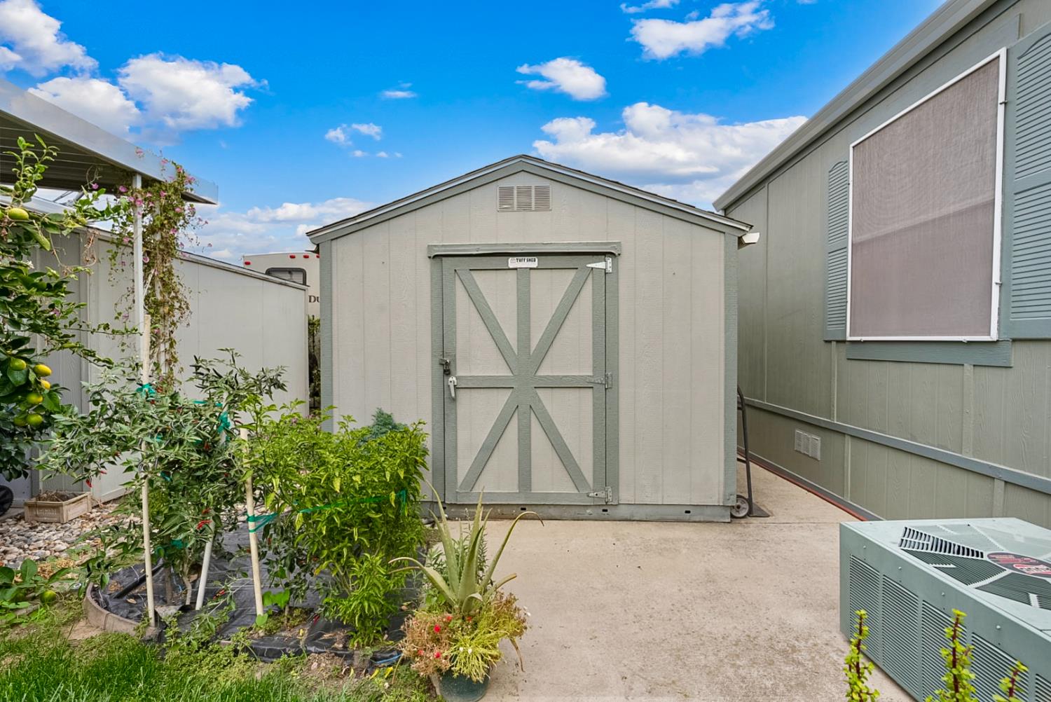 2841 Fowler Road, Unit 33 Ceres, CA 95307 - Photo 22 of 29 a view of outdoor space and front view of a house