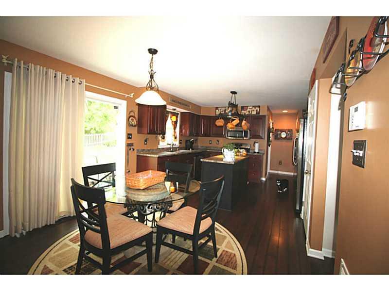 Kitchen. Separate breakfast area with access to patio