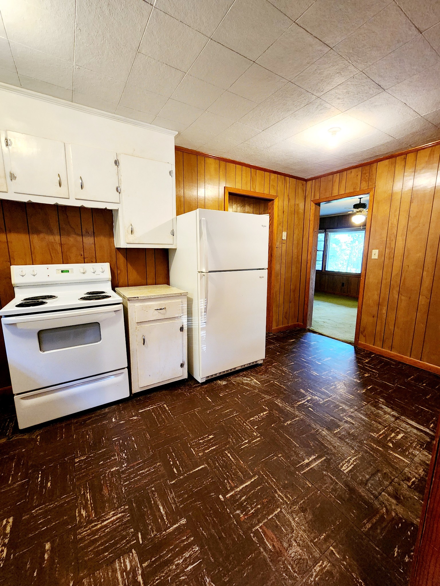 9558 Mt Carmel Road Decaturville, TN 38329 - Photo 19 of 24 a utility room with cabinets