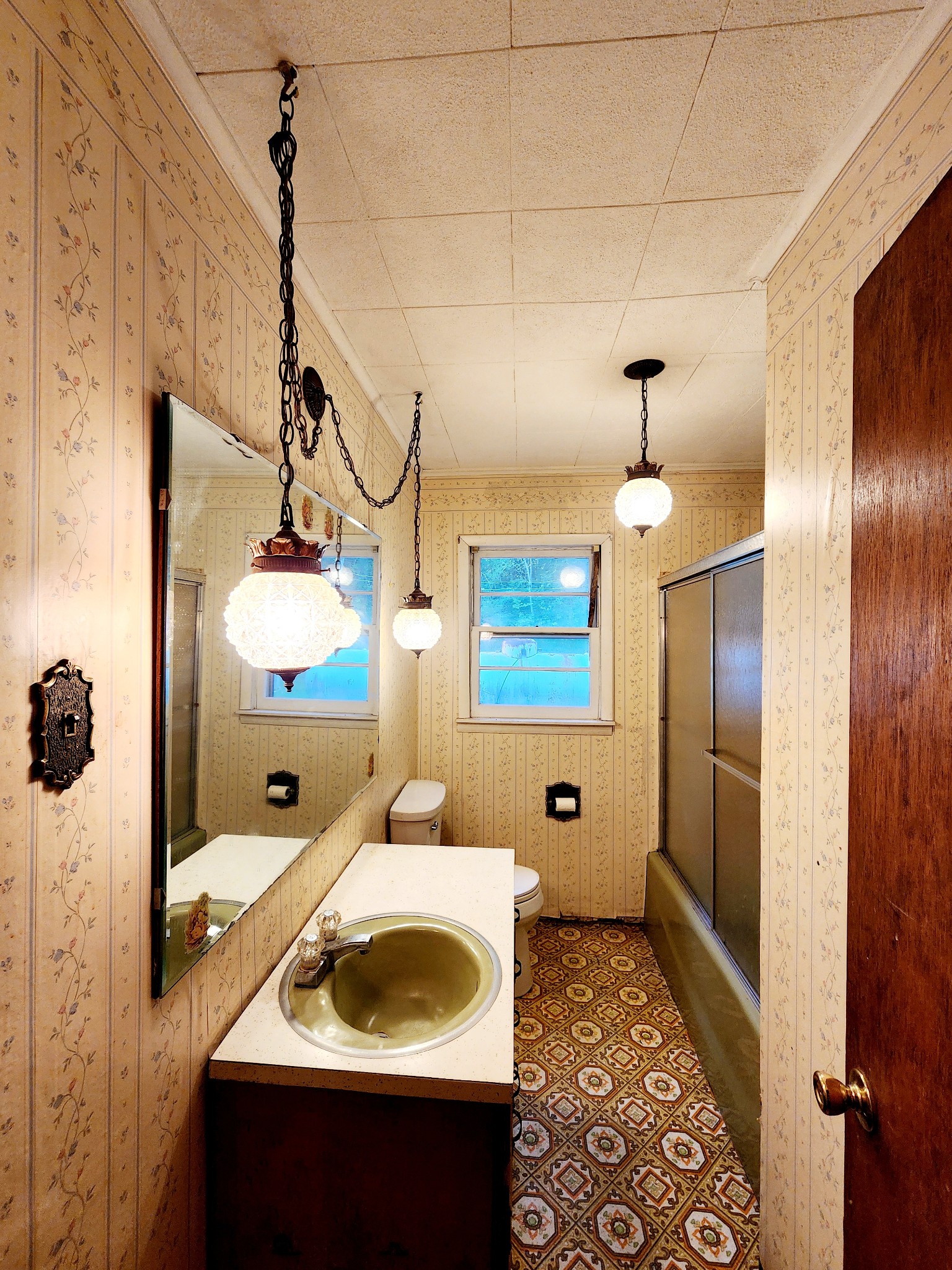 9558 Mt Carmel Road Decaturville, TN 38329 - Photo 20 of 24 a bathroom with a sink and a mirror