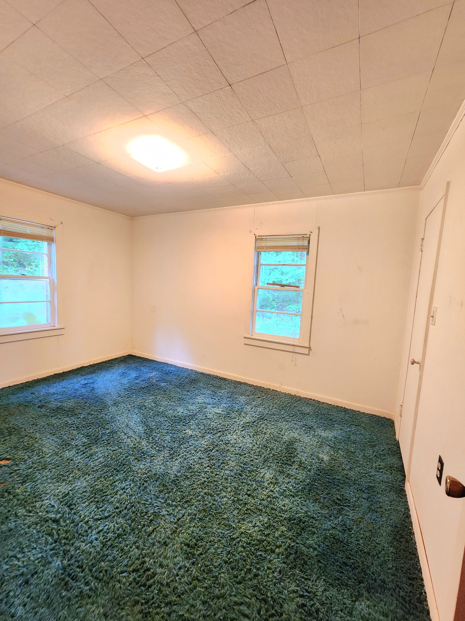 9558 Mt Carmel Road Decaturville, TN 38329 - Photo 23 of 24 a view of empty room with window