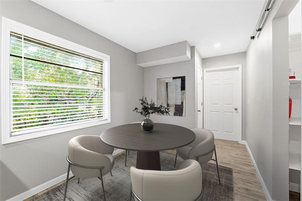 12210 State Street Tampa, FL 33635 - Photo 20 of 41 a table and chairs in a room