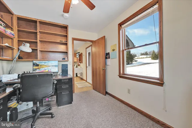 a kitchen with refrigerator cabinets dining table and chairs
