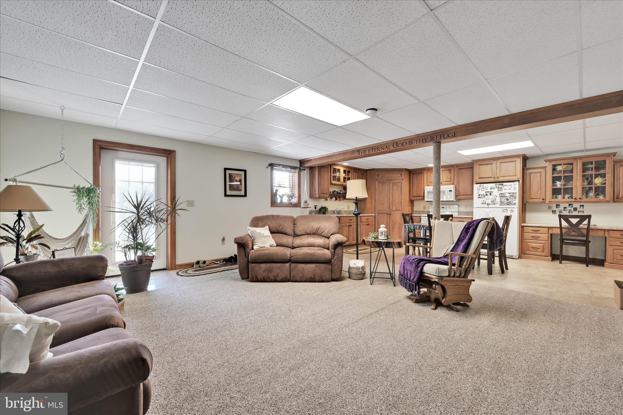 36 Host Road Womelsdorf, PA 19567 - Photo 33 of 78 a living room with furniture gym equipment and a large window