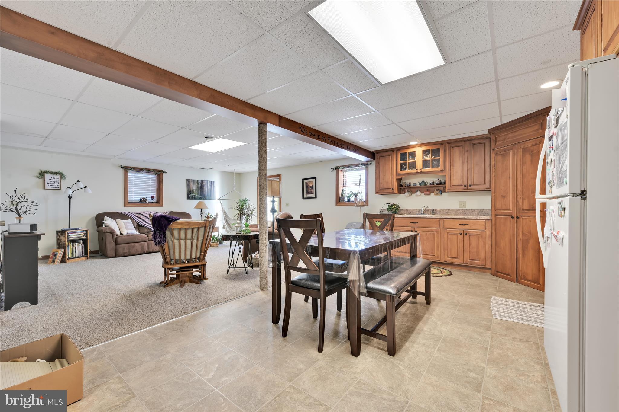 36 Host Road Womelsdorf, PA 19567 - Photo 36 of 78 a kitchen with a table chairs and a refrigerator