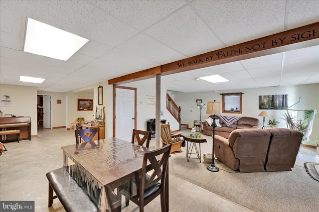 a bathroom with a sink vanity and a mirror