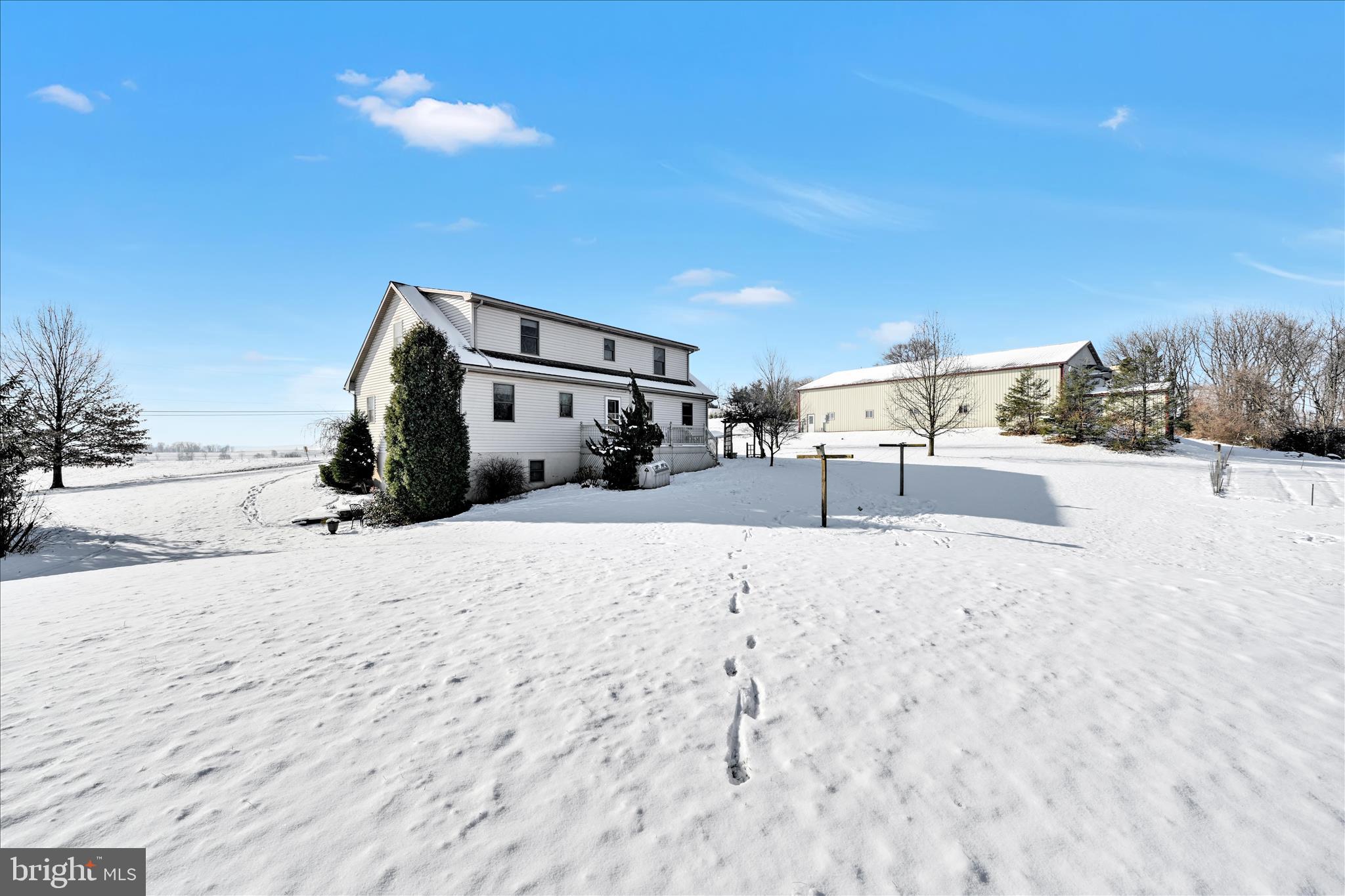 36 Host Road Womelsdorf, PA 19567 - Photo 53 of 78 a wooden bench sitting in middle of a snow
