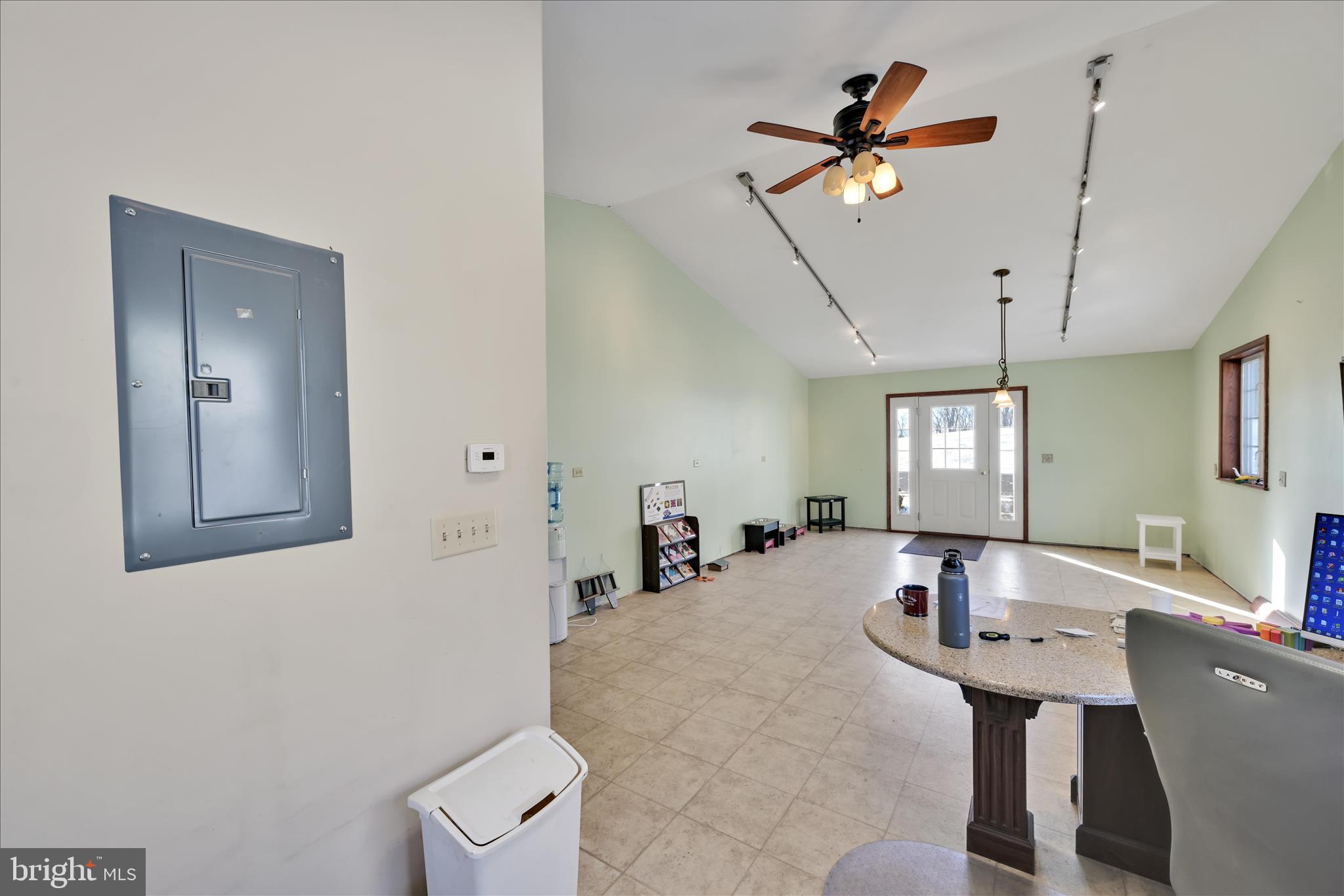 36 Host Road Womelsdorf, PA 19567 - Photo 59 of 78 a view of a a dining room with furniture and a chandelier fan