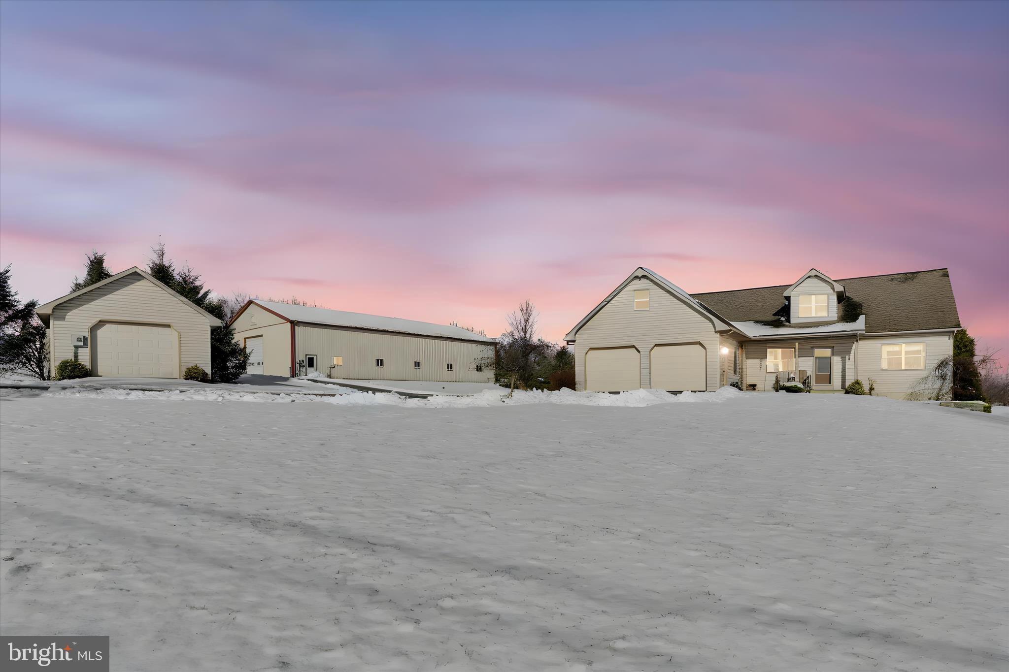 36 Host Road Womelsdorf, PA 19567 - Photo 8 of 78 a front view of a house with a yard and garage