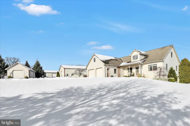 a view of a road with a building in the background