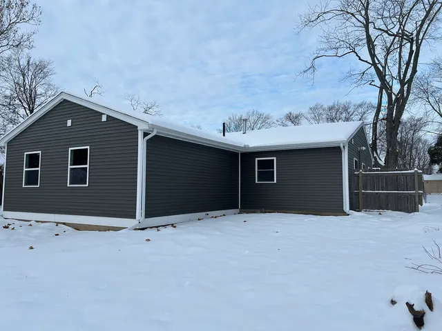 a front view of house with garage