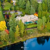 a view of a lake with a building in the background