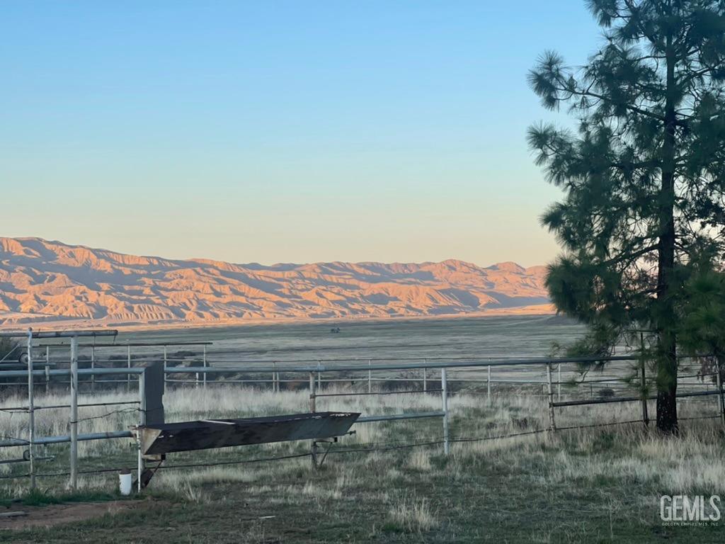 a view of house with a lake view
