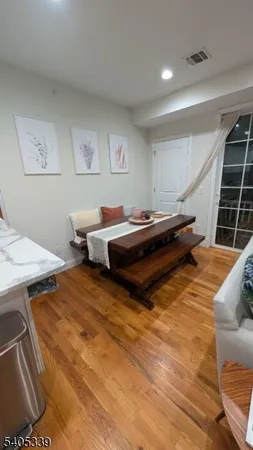 a spacious bedroom with a bed and furniture