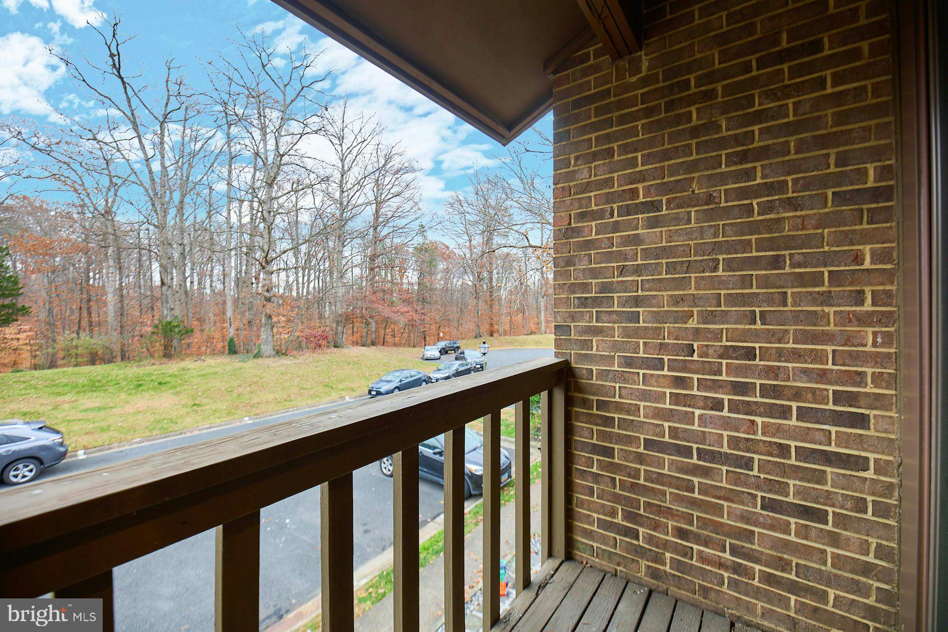 8566 Gwynedd Way Springfield, VA 22153 - Photo 18 of 61 a view of swimming pool from a balcony