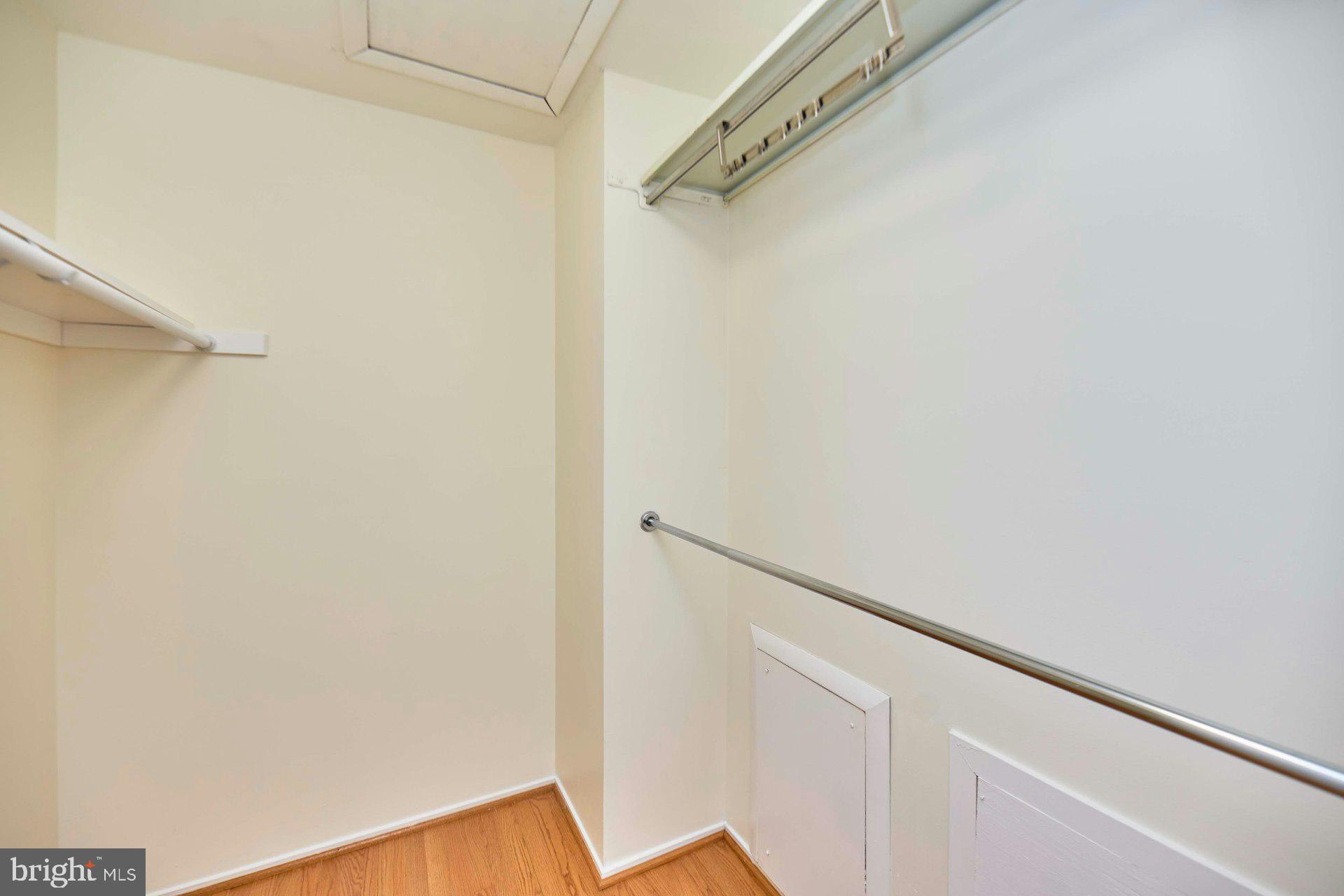 8566 Gwynedd Way Springfield, VA 22153 - Photo 19 of 61 a view of small space with racks on the wall