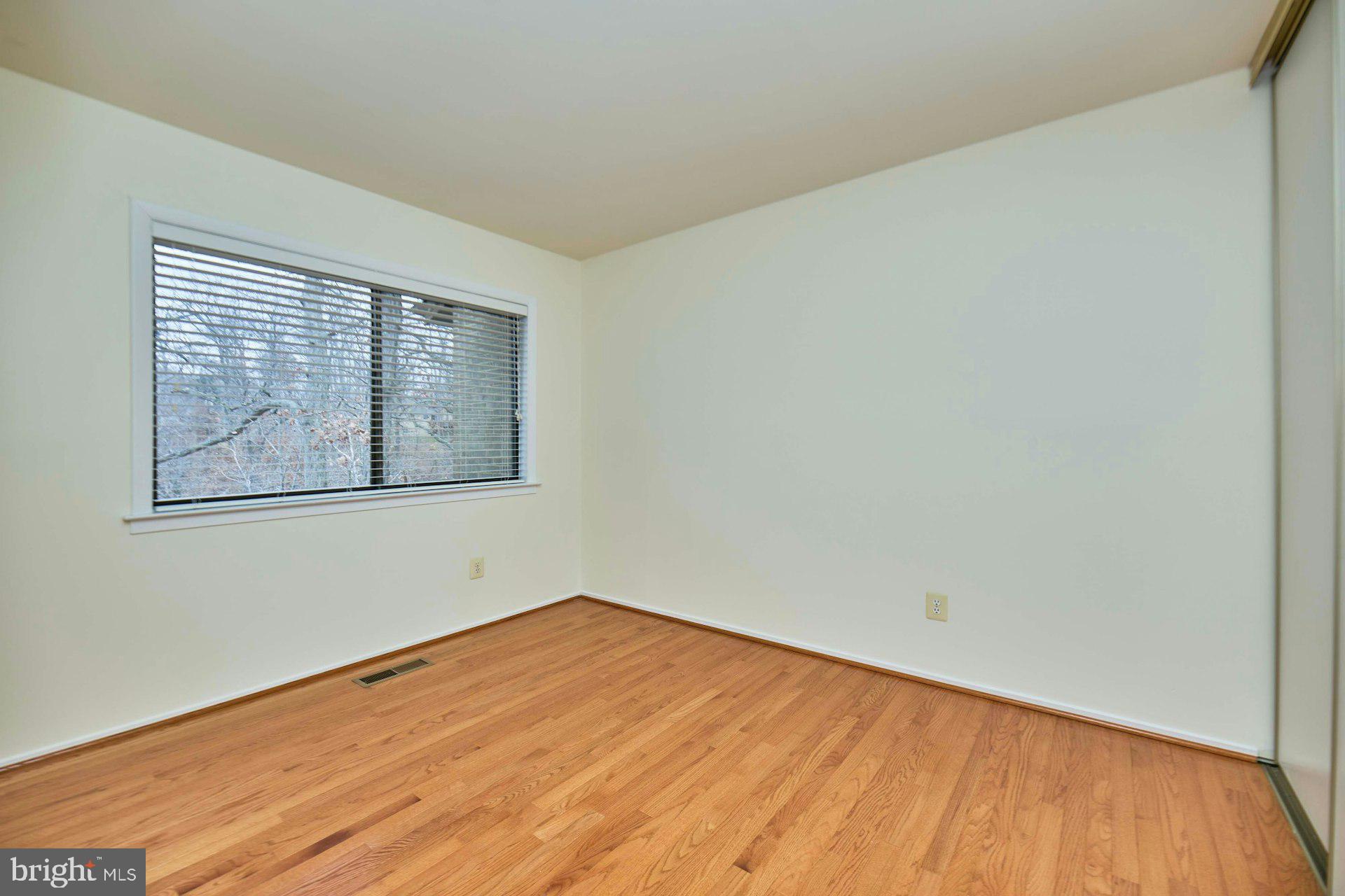 8566 Gwynedd Way Springfield, VA 22153 - Photo 44 of 61 an empty room with a window