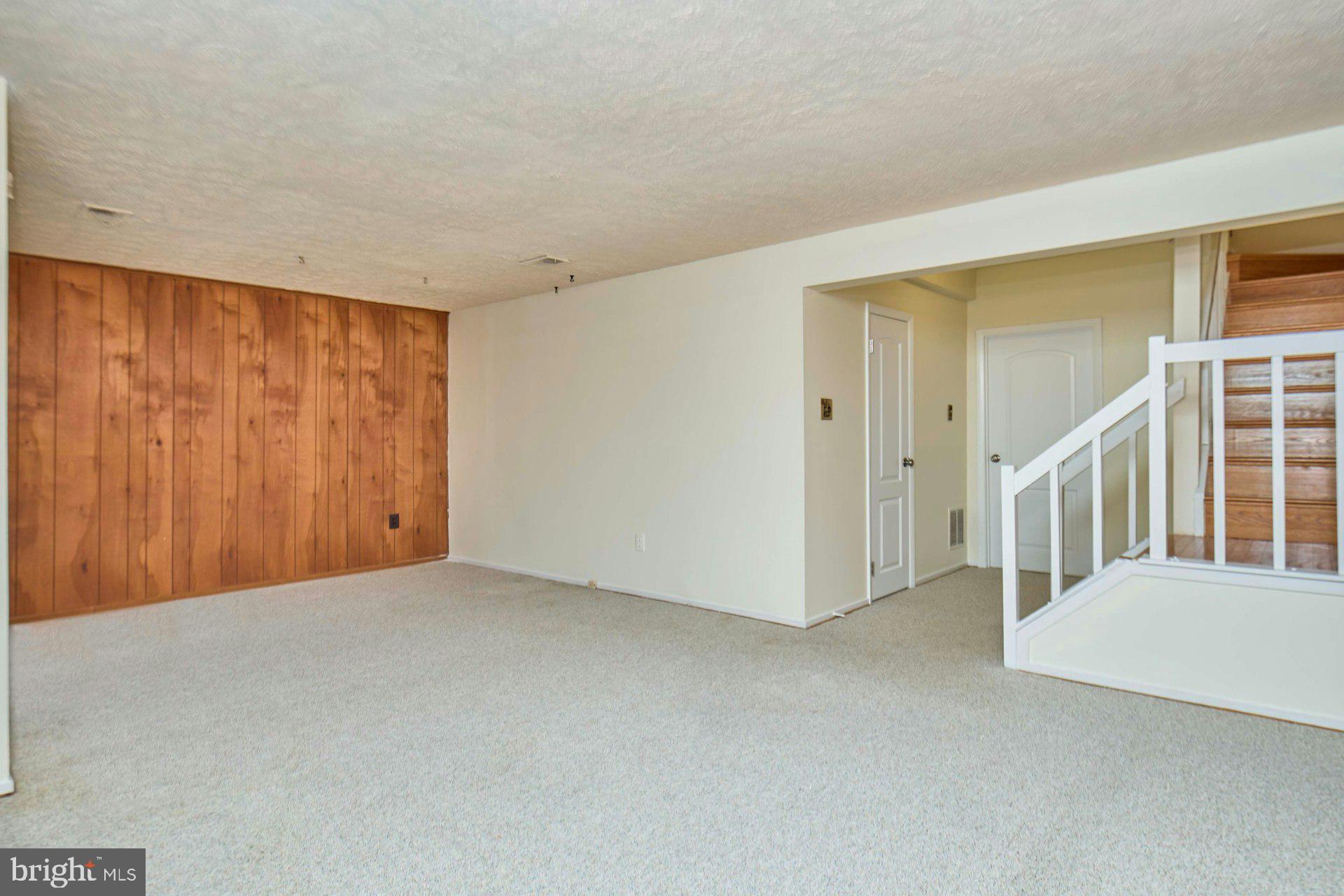 8566 Gwynedd Way Springfield, VA 22153 - Photo 49 of 61 a view of an empty room with a window