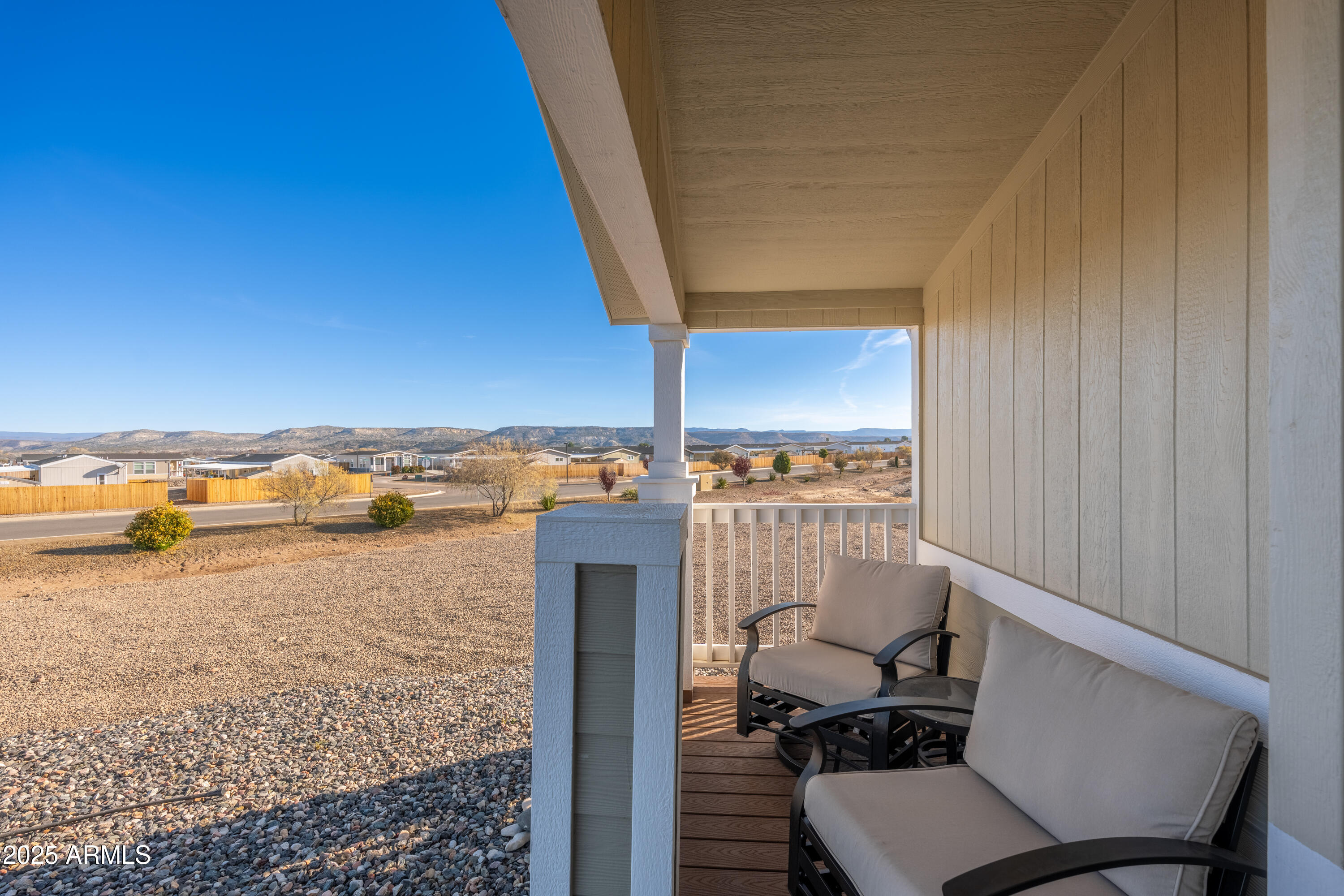 1033 Wheeler Road Camp Verde, AZ 86322 - Photo 3 of 51 a view of a balcony with chair and table