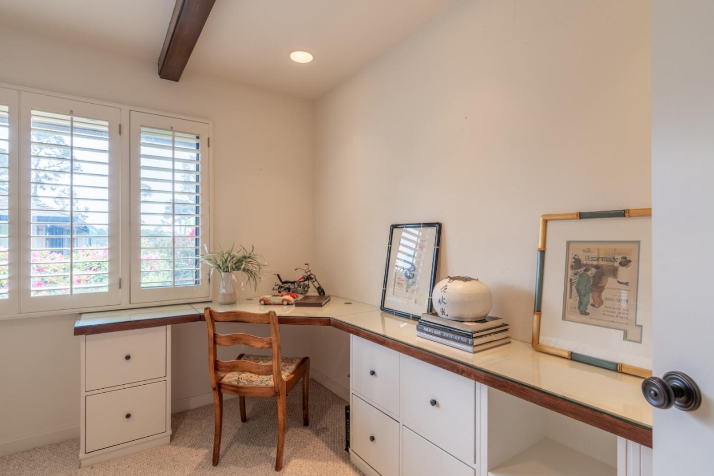 142 Del Mesa Carmel Carmel, CA 93923 - Photo 14 of 39 a room with a window bed and cabinets