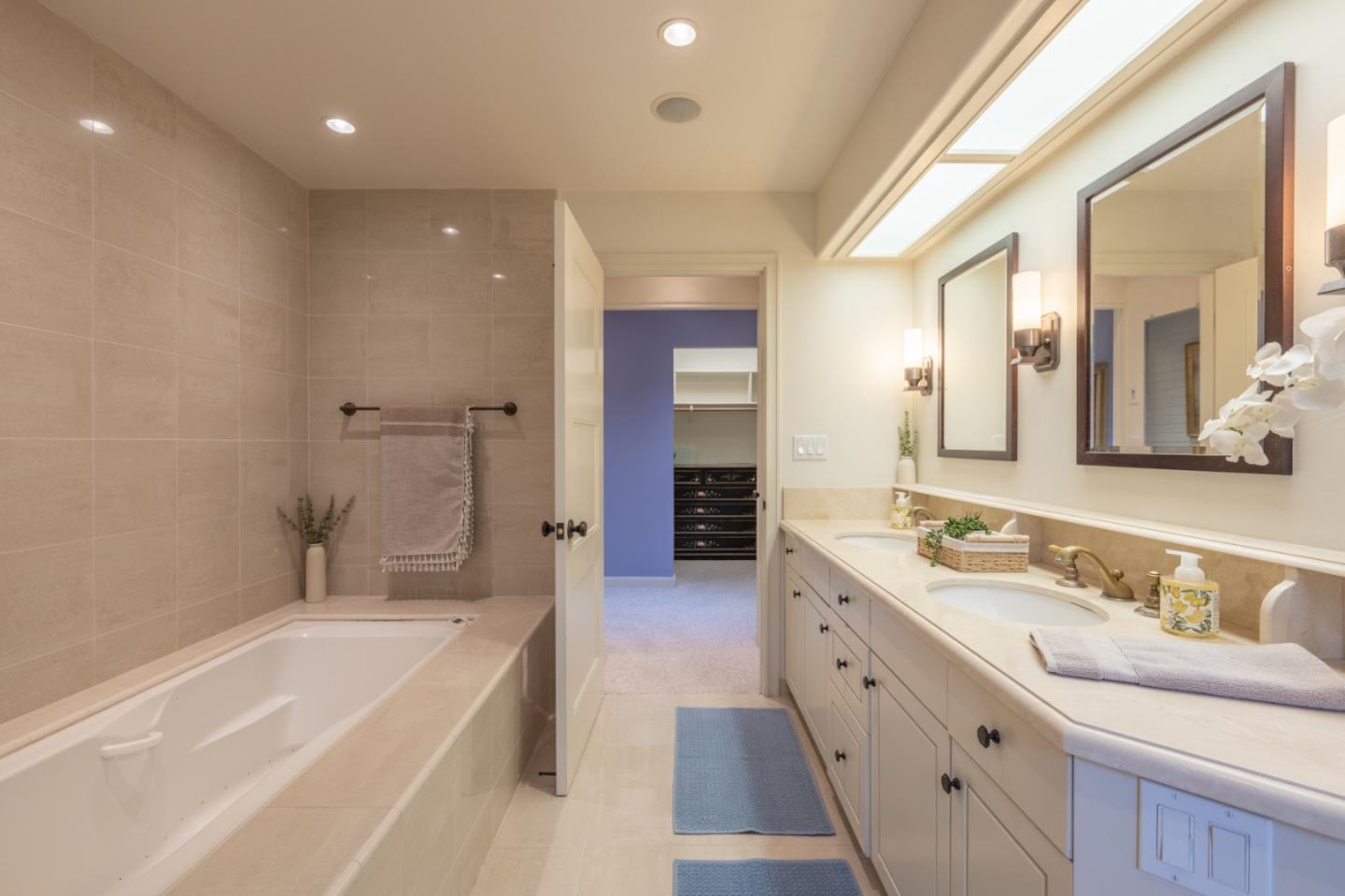 142 Del Mesa Carmel Carmel, CA 93923 - Photo 21 of 39 a spacious bathroom with a large tub sink and vanity