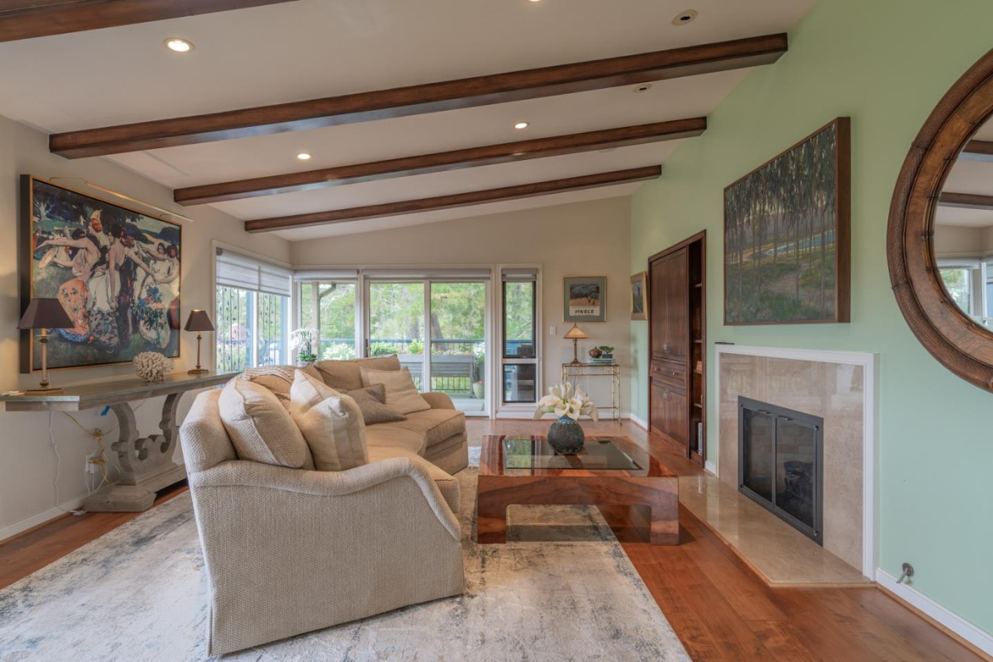 142 Del Mesa Carmel Carmel, CA 93923 - Photo 3 of 39 a living room with furniture and a fireplace