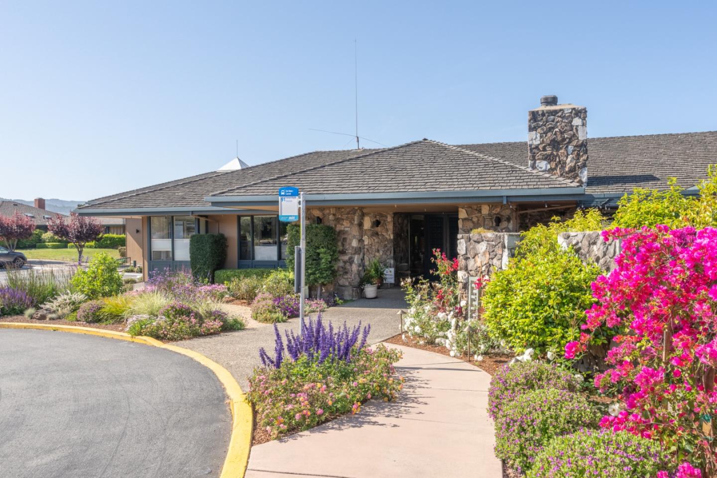 142 Del Mesa Carmel Carmel, CA 93923 - Photo 38 of 39 a front view of a house with a porch and outdoor seating