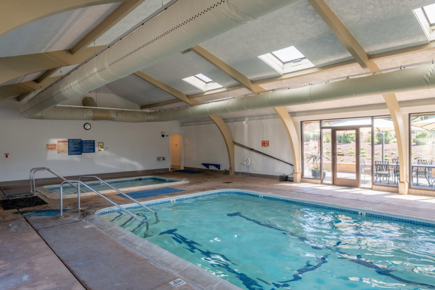 142 Del Mesa Carmel Carmel, CA 93923 - Photo 39 of 39 a room with lots of windows and couches