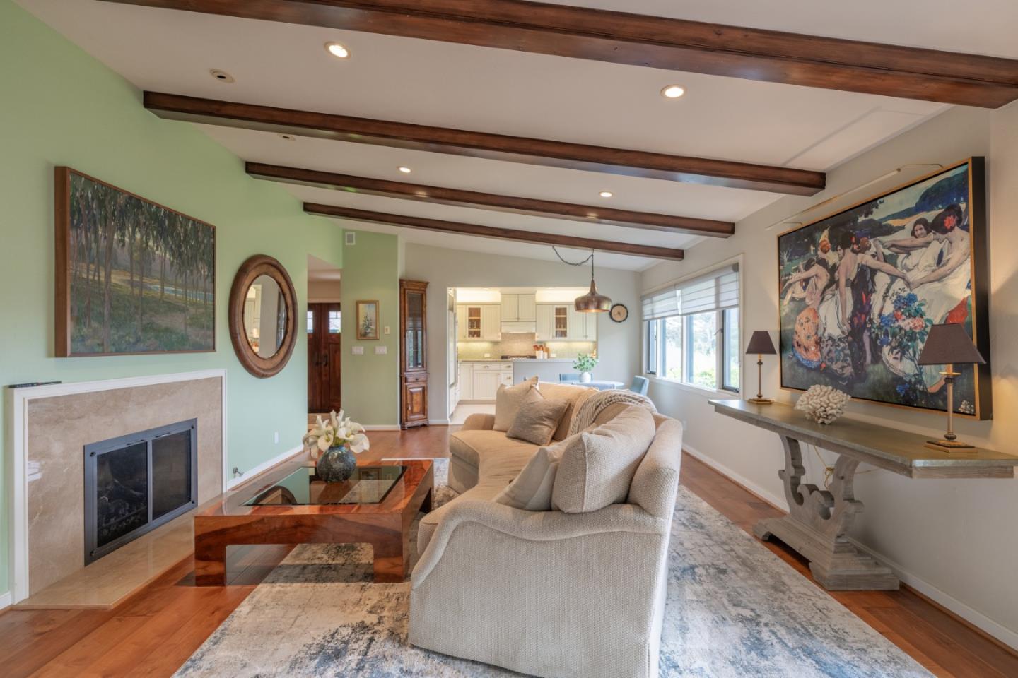142 Del Mesa Carmel Carmel, CA 93923 - Photo 4 of 39 a living room with furniture a fireplace and a large window