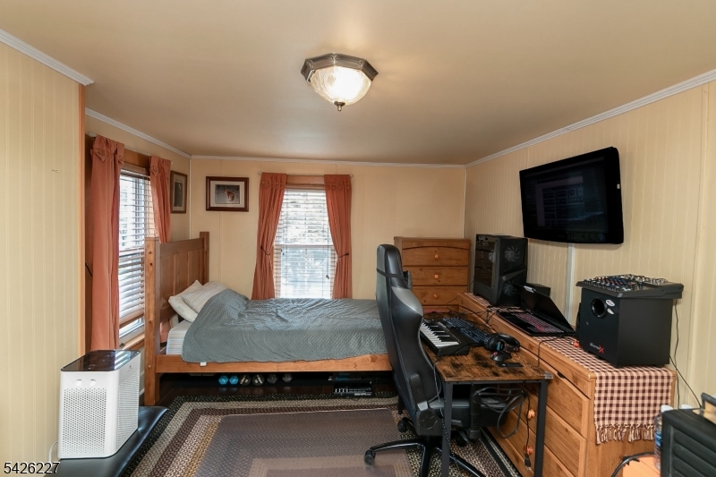 36 Main Street Flanders, NJ 07836 - Photo 25 of 49 a view of a workspace with furniture and a window