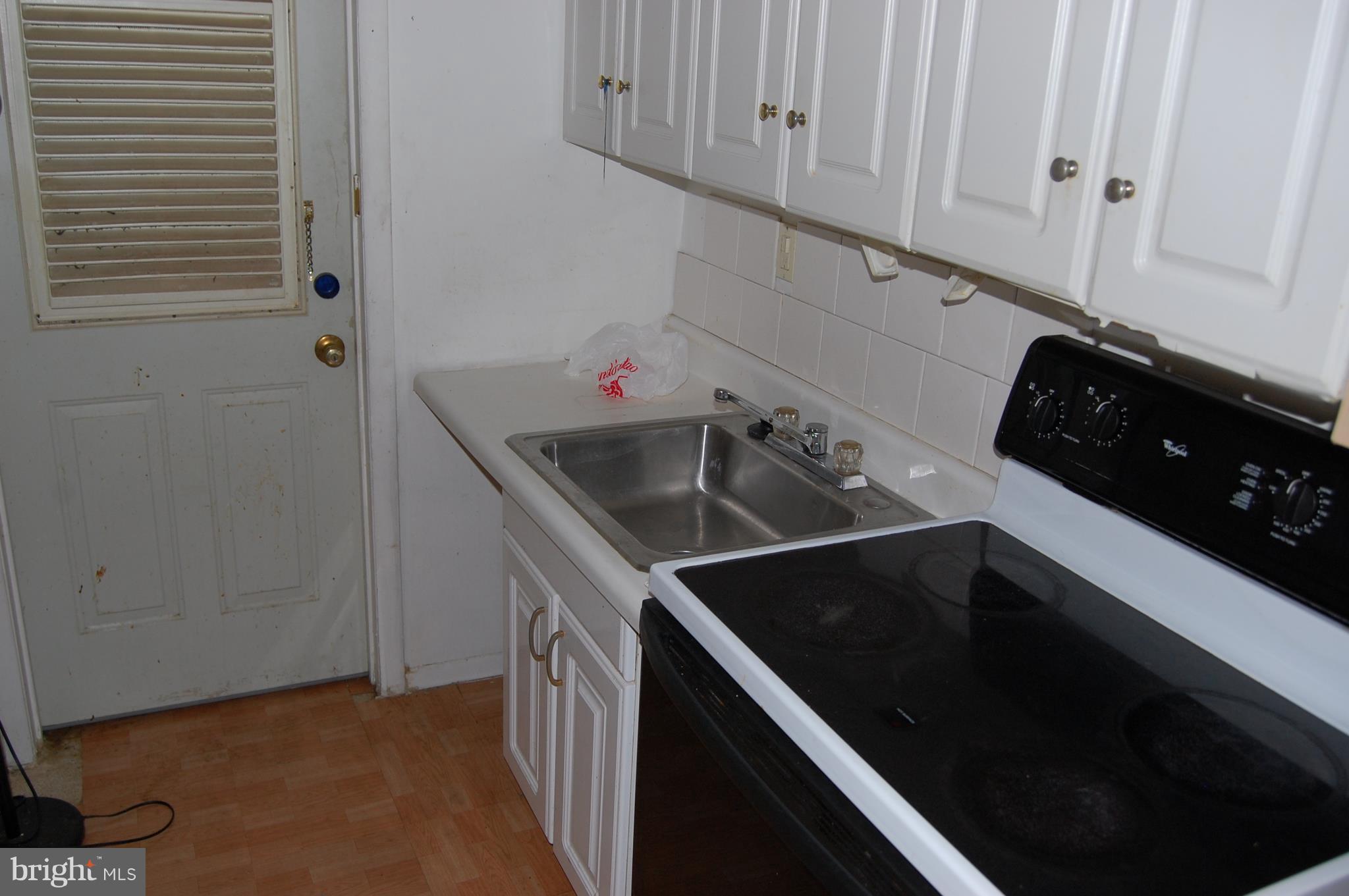 8900 Adelphi Road Adelphi, MD 20783 - Photo 16 of 23 One of 2 basement kitchens