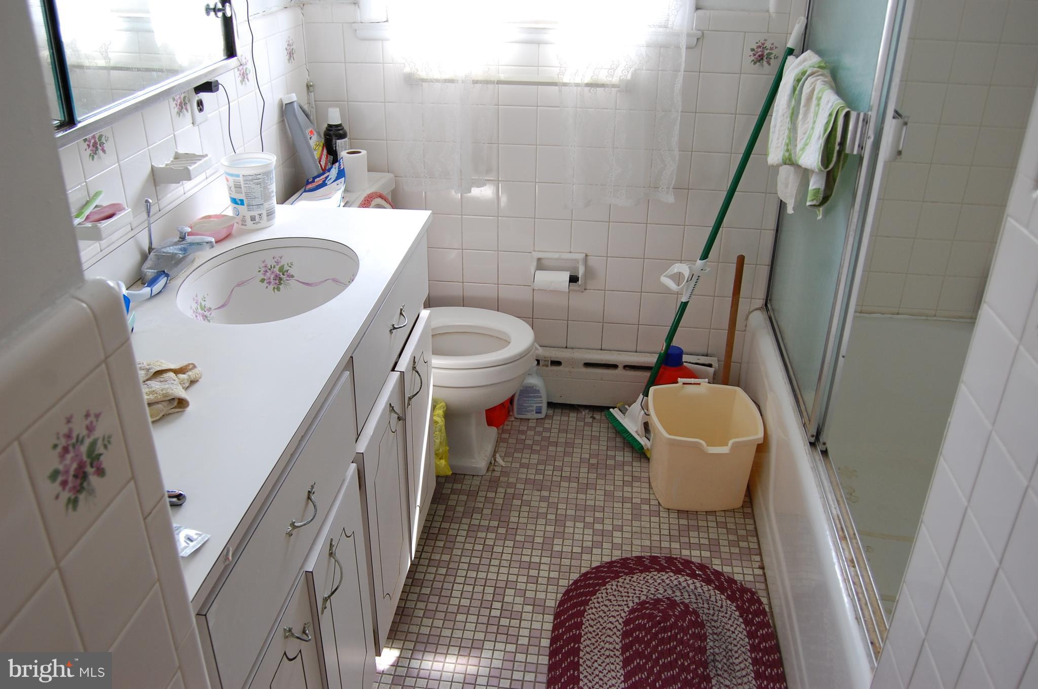 8900 Adelphi Road Adelphi, MD 20783 - Photo 9 of 23 Main level bathroom