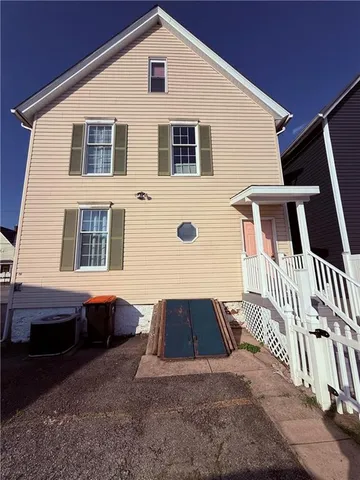 a view of balcony with furniture